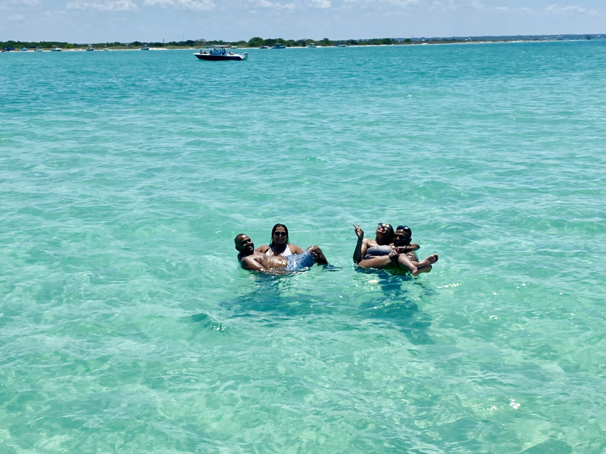 Two couples having fun in the water