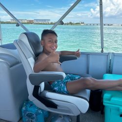 kid on pontoon boat Clearwater Beach